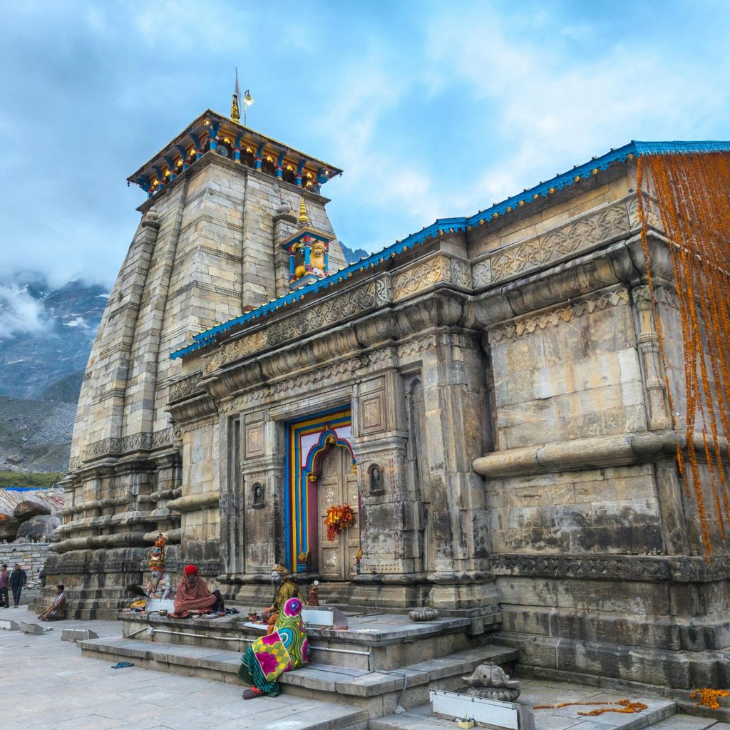 Wide-angle view of Kedarnath Temple and surrounding Himalayan peaks during Char Dham Yatra 2026